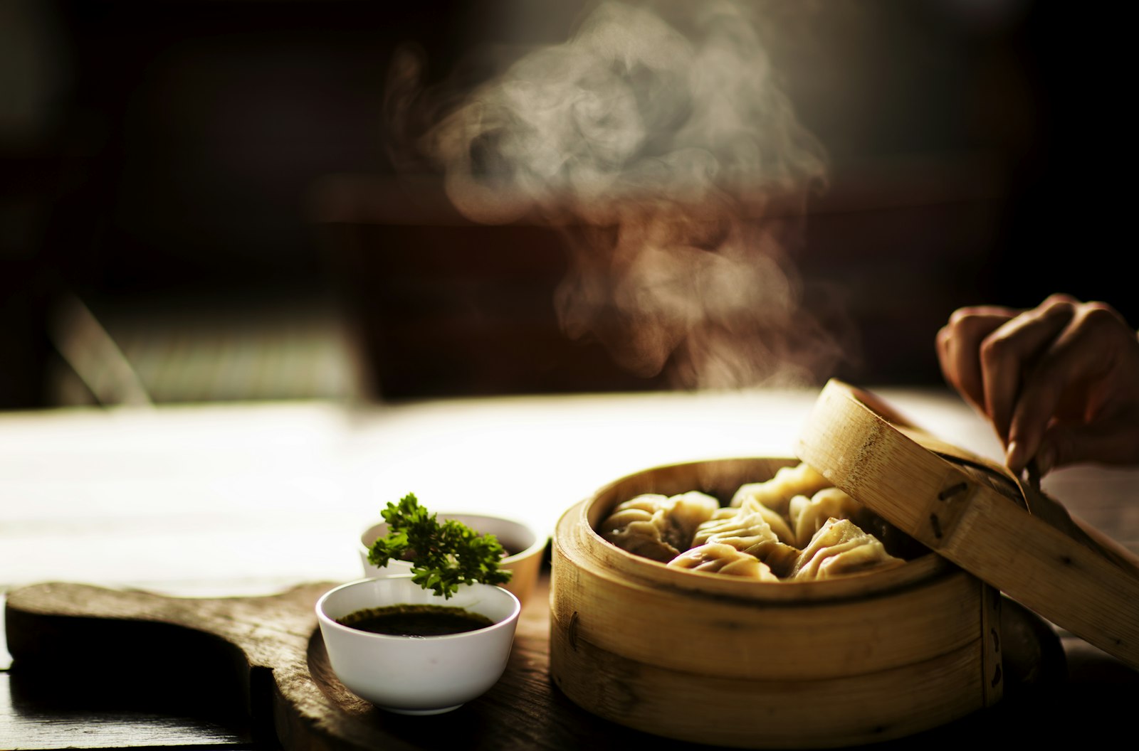 Steamed dumplings in a bamboo steamer